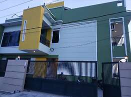 Hotel O Tri Homestay