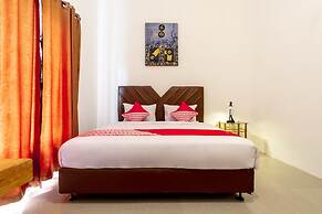 Capital O 92444 Kamojo Guest House