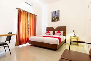 Capital O 92444 Kamojo Guest House