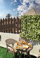 Osiris pyramids view inn