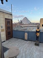 Osiris pyramids view inn