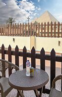 Osiris pyramids view inn