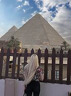 Osiris pyramids view inn