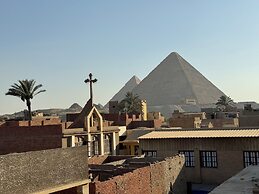 Osiris pyramids view inn