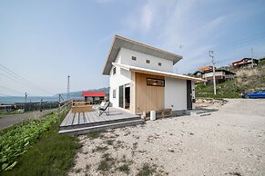 SUNNY SIDE HOUSE