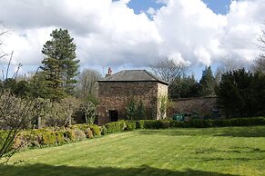 a Quirky Garden Building in an Orchard