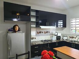 Master Bedroom with Shared Kitchen