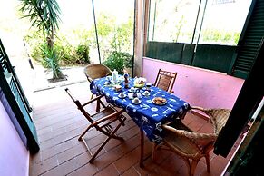 Comfortable Three-room Villa Located in Torre Dell'orso on the Ground 