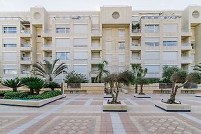 Marina Apartment by Olala Homes