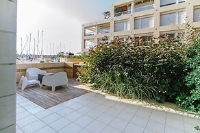 Marina Apartment by Olala Homes