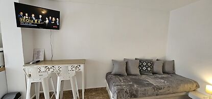 Santorini Studios Pleasure By The Sea