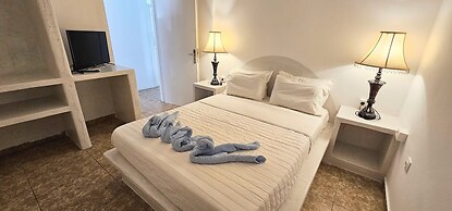 Santorini Studios Pleasure By The Sea