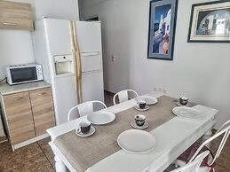 Santorini Studios Pleasure By The Sea