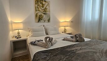 Santorini Studios Pleasure By The Sea