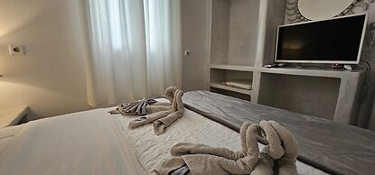 Santorini Studios Pleasure By The Sea
