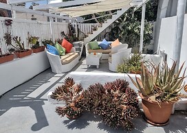 Santorini Studios Pleasure By The Sea