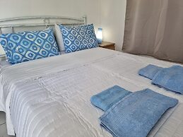 Santorini Studios Pleasure By The Sea