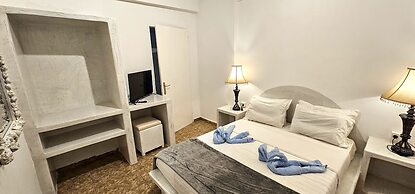 Santorini Studios Pleasure By The Sea