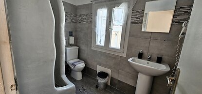 Santorini Studios Pleasure By The Sea