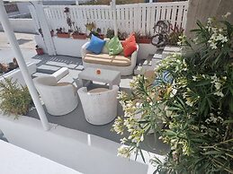 Santorini Studios Pleasure By The Sea