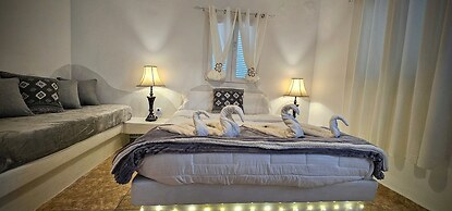 Santorini Studios Pleasure By The Sea