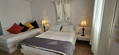 Santorini Studios Pleasure By The Sea