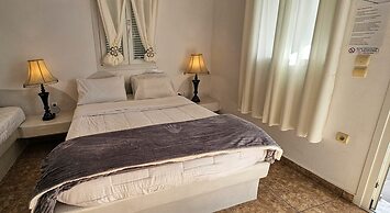 Santorini Studios Pleasure By The Sea