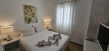 Santorini Studios Pleasure By The Sea