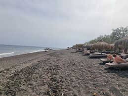 Santorini Studios Pleasure By The Sea