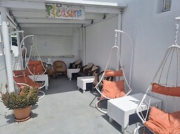 Santorini Studios Pleasure By The Sea