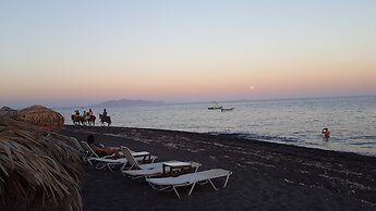 Santorini Studios Pleasure By The Sea