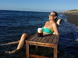 Santorini Studios Pleasure By The Sea