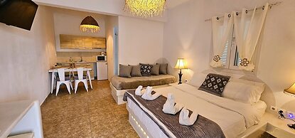 Santorini Studios Pleasure By The Sea