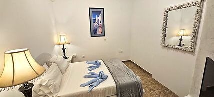 Santorini Studios Pleasure By The Sea
