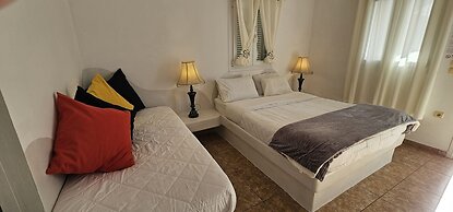 Santorini Studios Pleasure By The Sea