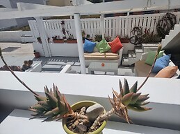 Santorini Studios Pleasure By The Sea