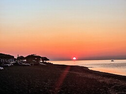 Santorini Studios Pleasure By The Sea