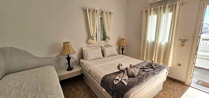 Santorini Studios Pleasure By The Sea