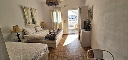 Santorini Studios Pleasure By The Sea