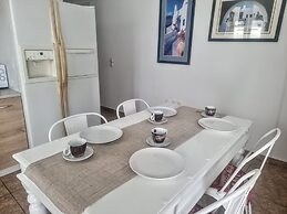 Santorini Studios Pleasure By The Sea