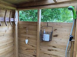 1br-sleeps2-field View-parking-cabin Experience