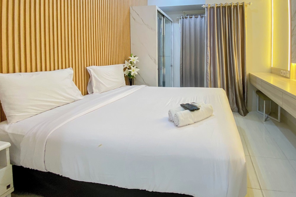 Nice And Cozy Studio At Amartha View Apartment