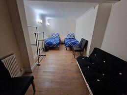 Rooms with Shared Bath Kitchen Parking