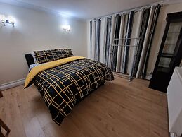 Rooms with Shared Bath Kitchen Parking