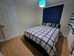 Rooms with Shared Bath Kitchen Parking