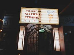 Nefertiti pyramids view -