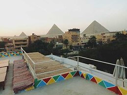 Nefertiti pyramids view -