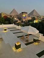 Nefertiti pyramids view -