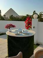 Nefertiti pyramids view -