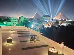 Nefertiti pyramids view -
